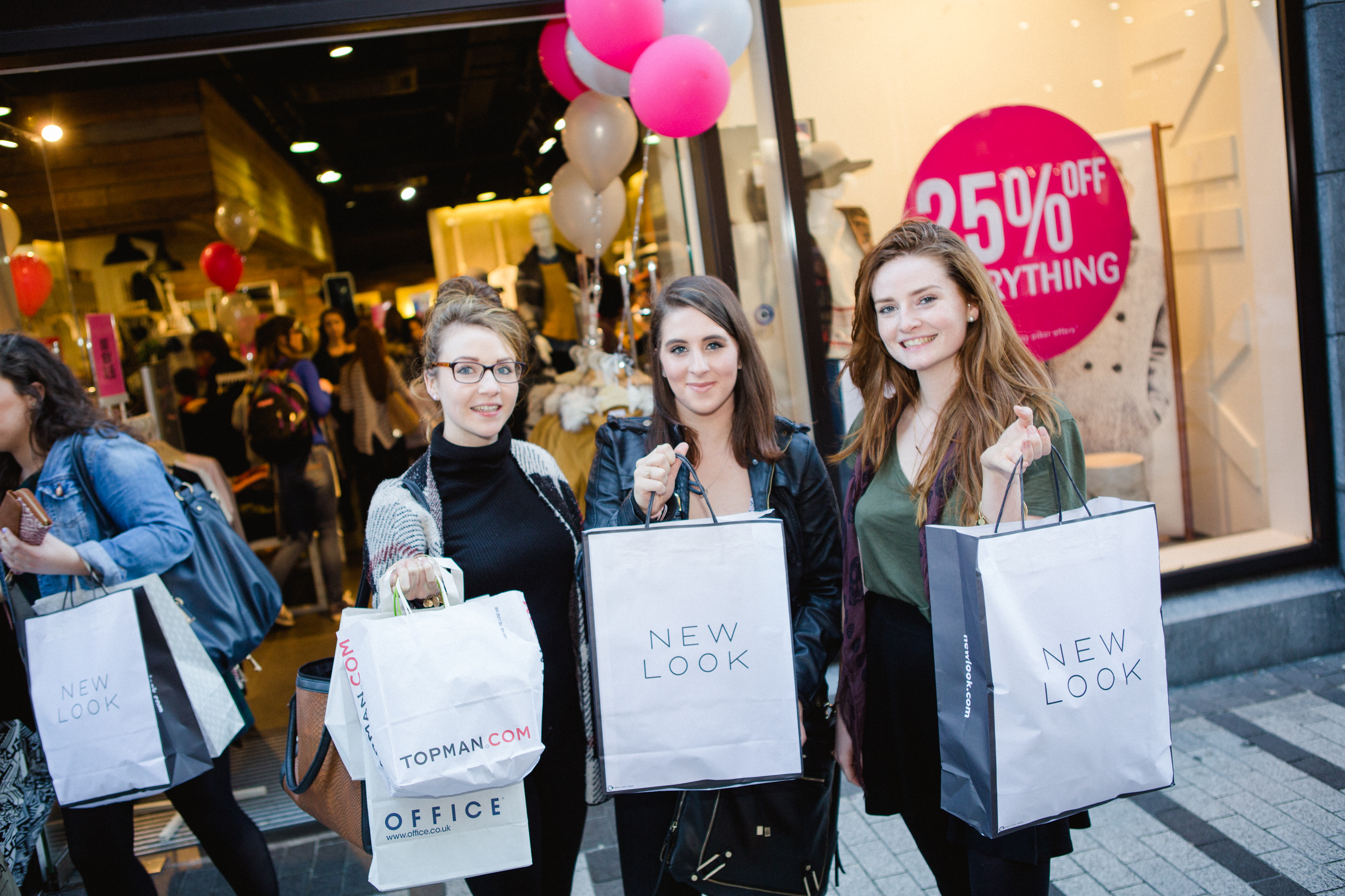 Aisling, Sarah and Gemma sporting this years most sought after accessory - a shopping bag from Opera Lane!
